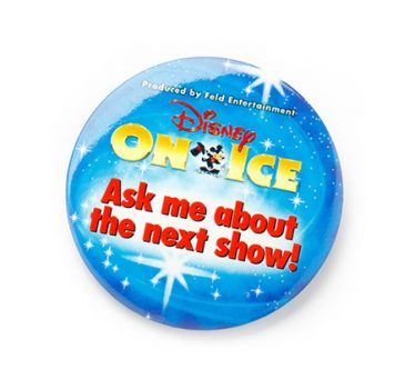 Blue round button badge with Disney logo